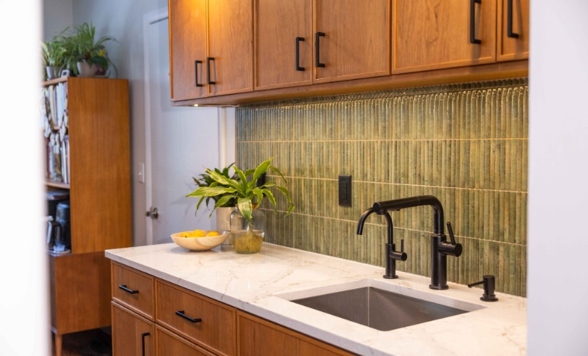 Warm Wood Cabinets with Fluted Tile Accent Kitchen near Ann Arbor Michigan